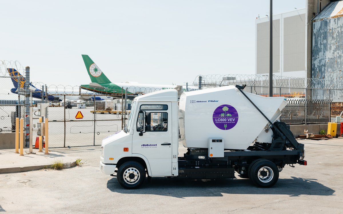 RoboStreet LC600 VEV electric refuse truck in service at JFK Airport